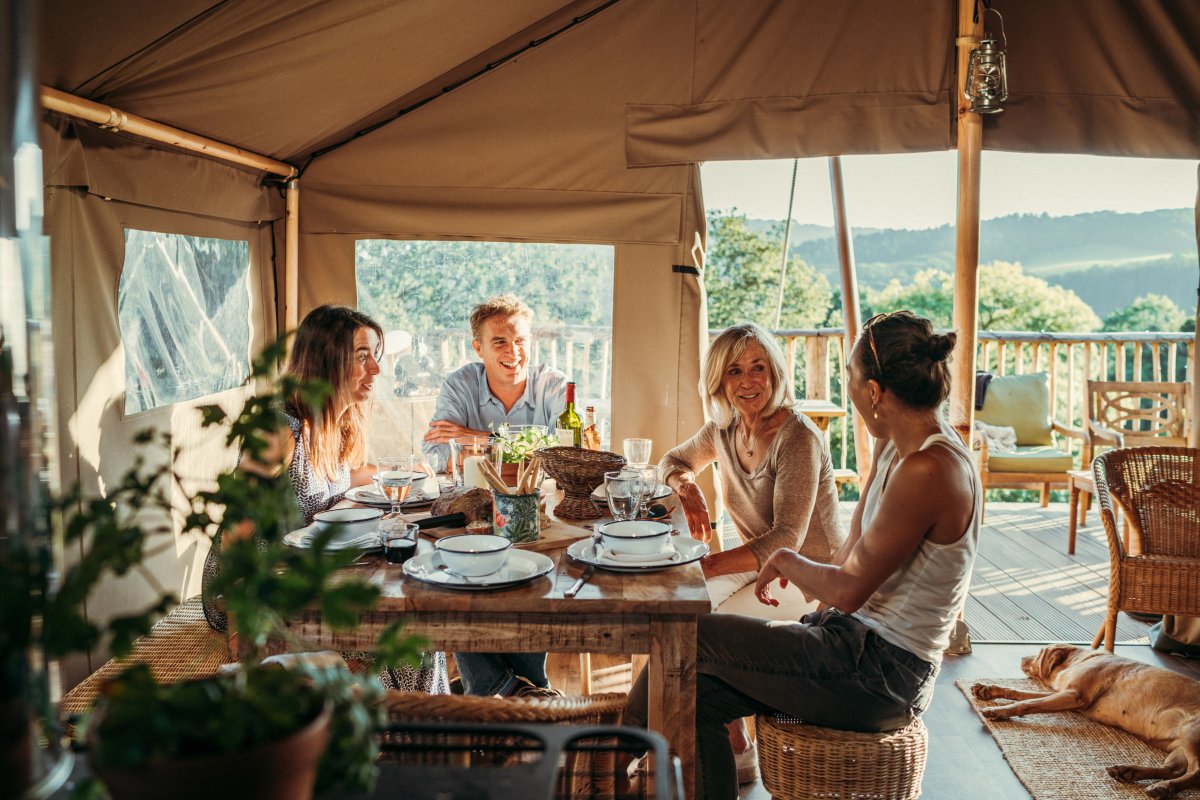 Exe Valley Glamping - sociable dining space inside each canvas lodge